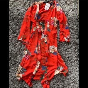 Forever 21 Red floral cardigan . New with tags!